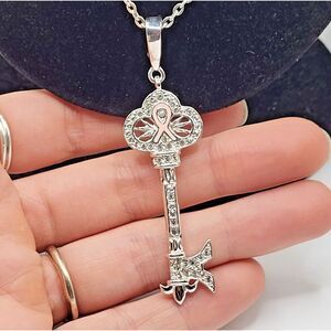 Kenneth Jay Lane Skeleton Key Pendant Chain Necklace Silver Tone Pink Ribbon